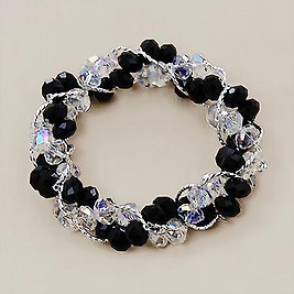BR242: Elegant Intertwining Crystal Bracelet